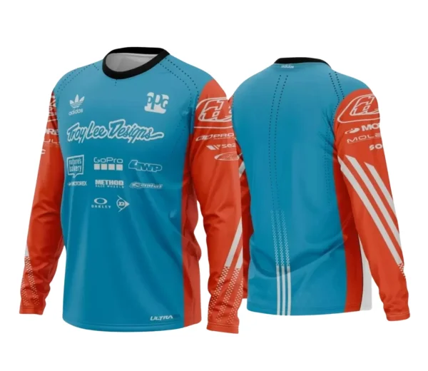 Camisa com logo no peito e estampa grande nas costas, exibindo design vibrante e moderno que representa a energia do motocross e a paixão dos trilheiros de modo autêntico e impactante.